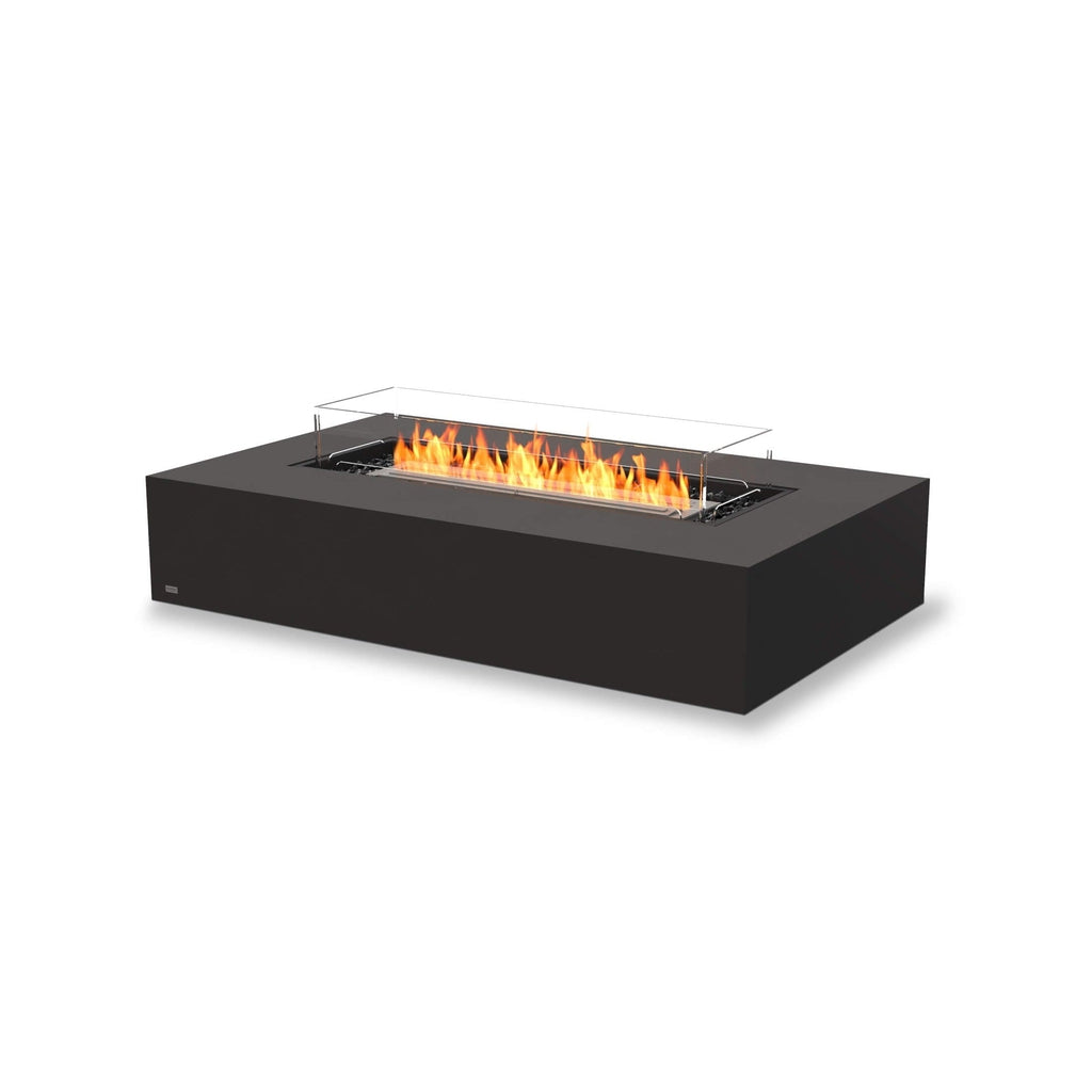 EcoSmart Fire Wharf 65 rectangular black ethanol fire pit table with a central flame and glass wind screen.