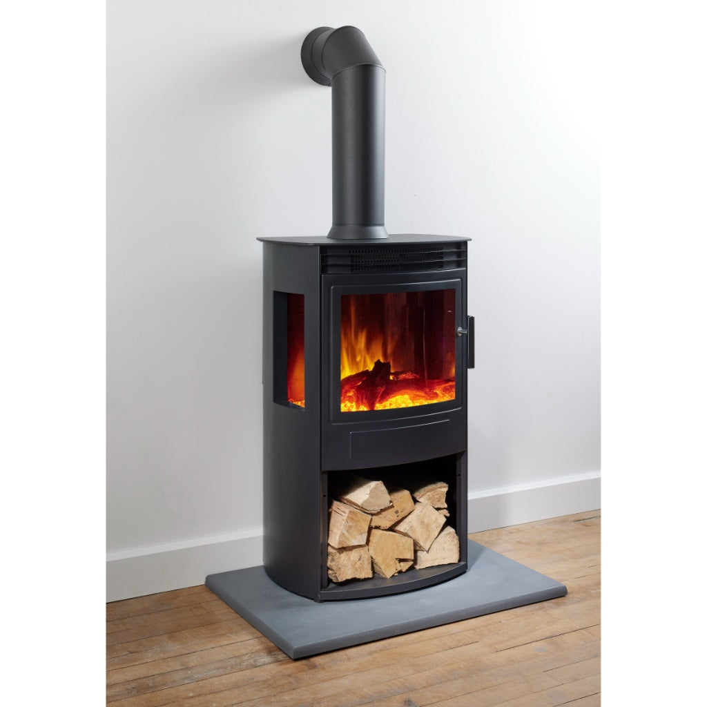 Flametek Alto T3 panoramic electric stove in black with a three-sided glass view, log storage, and a flue pipe.