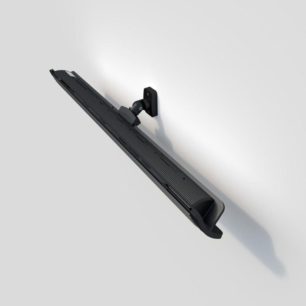 Heatscope Heaters Next 3000w electric radiant heater in matte black, wall-mounted at an angle against a white background.