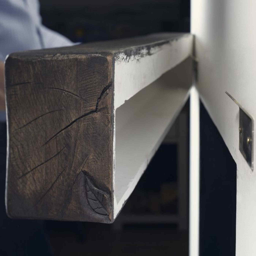 OER Classic 48 inch fireplace beam with a dark, rustic wood-effect end grain and a white underside.