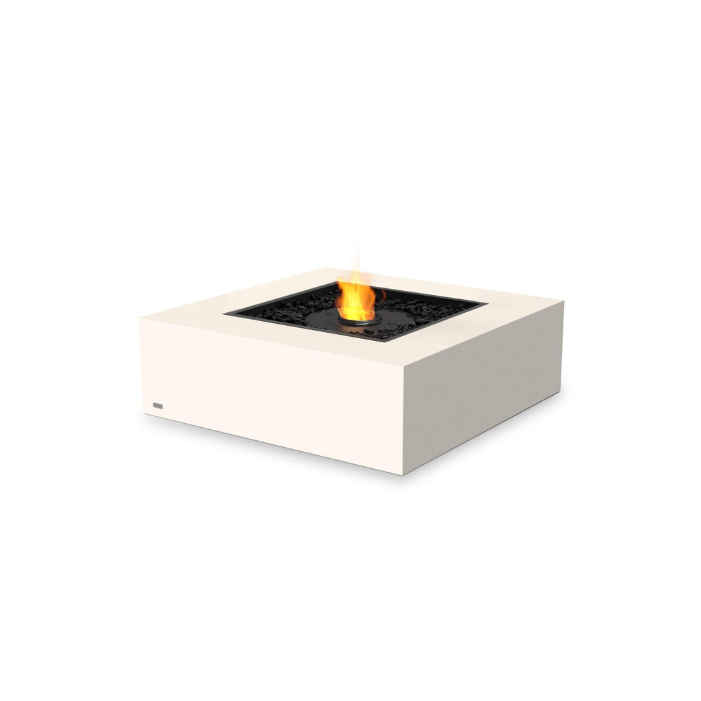 EcoSmart Fire Base 40 square white fire pit table with a central black burner and flickering flame on a white background.