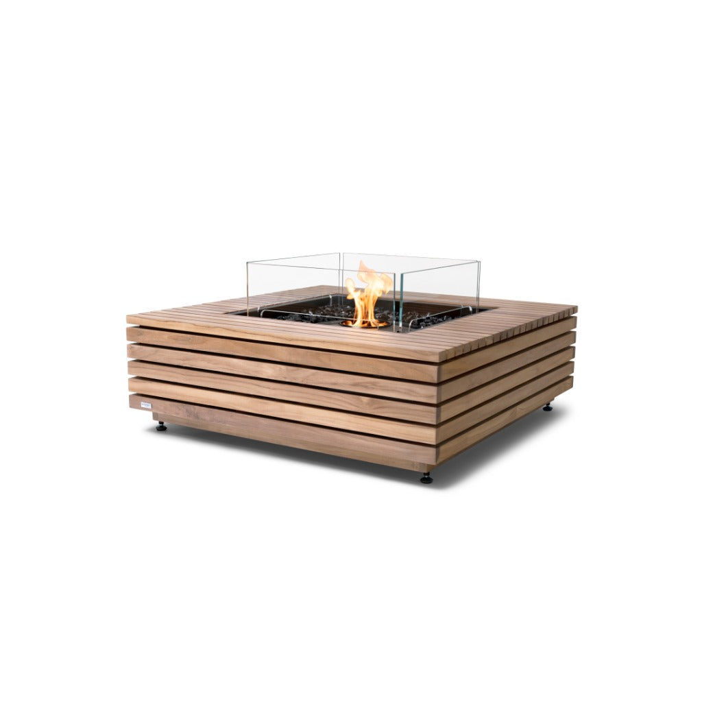 EcoSmart Fire Base 40 square teak slatted fire pit table with a central flame and glass wind screen.