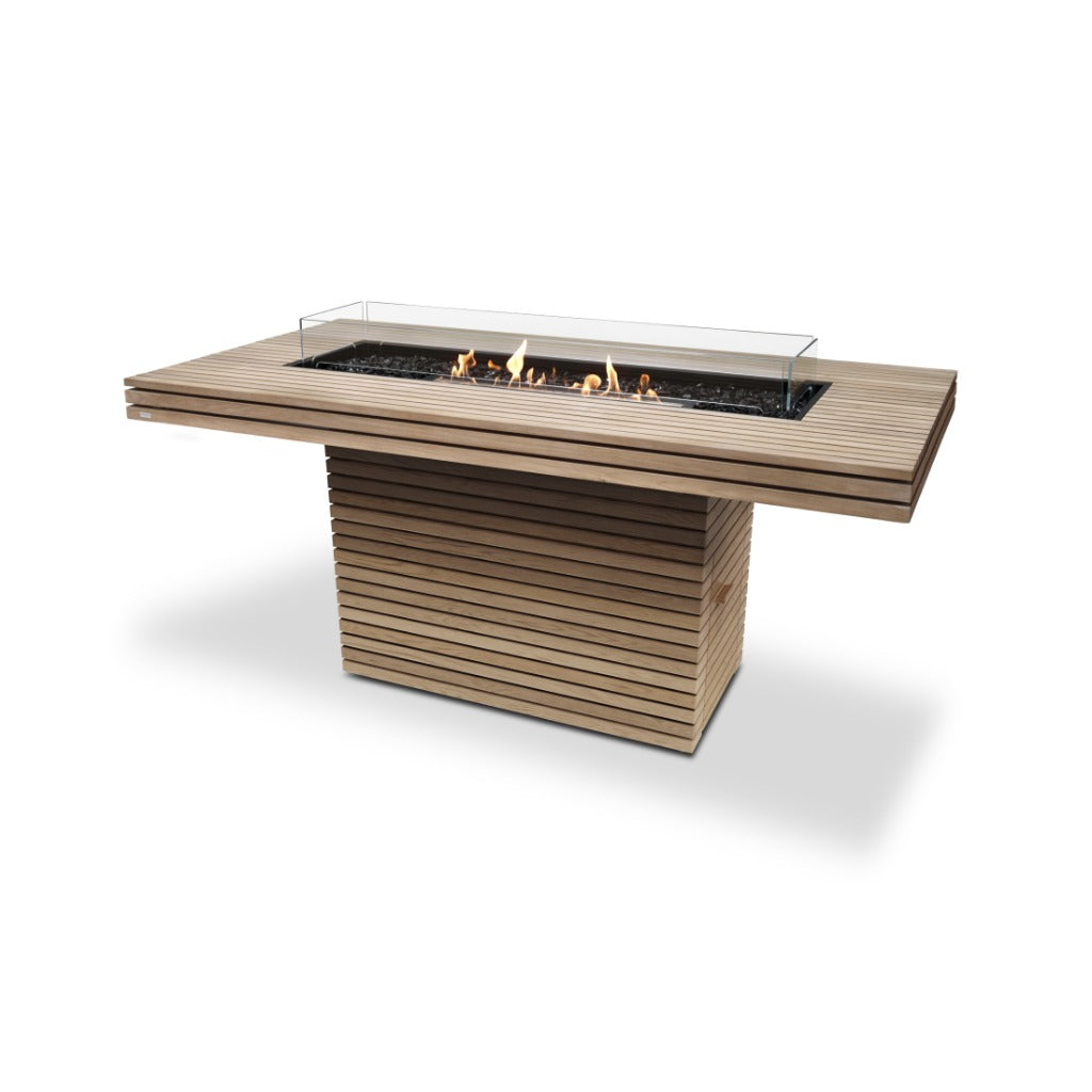 EcoSmart Fire Gin 90 bar table in slatted teak wood with a central bioethanol burner and glass fire screen.