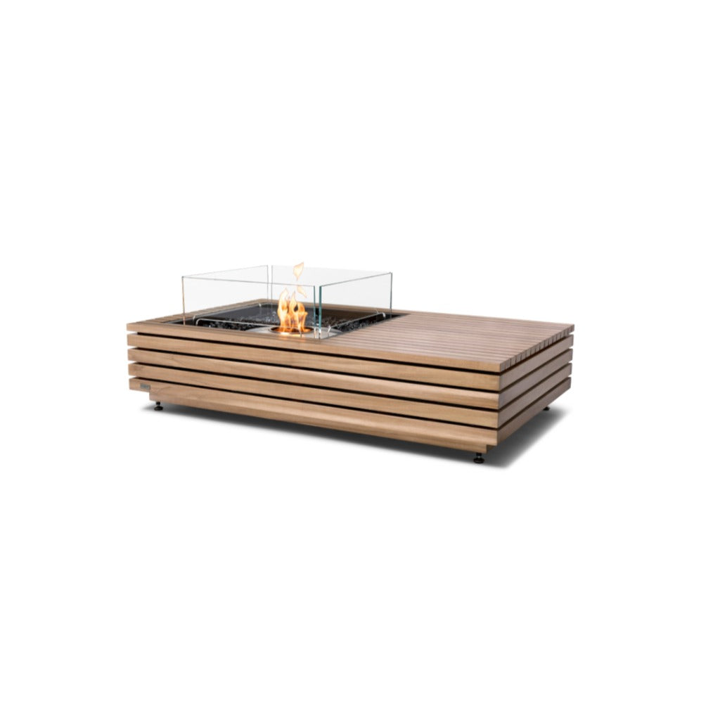 EcoSmart Fire Manhattan 50 bioethanol fire pit table in slatted teak wood with a central glass flame screen.