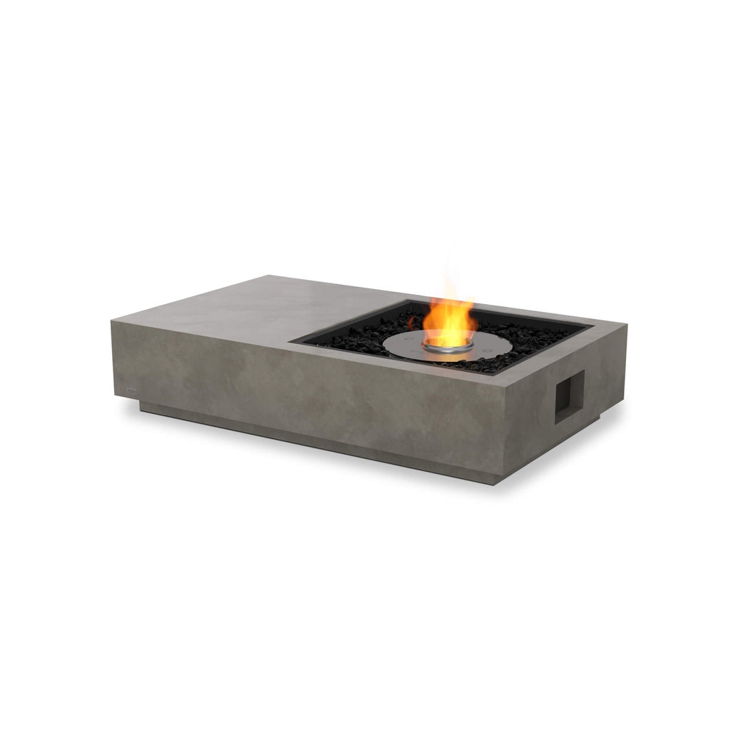 EcoSmart Fire Manhattan 50 bioethanol fire pit table in grey concrete with a central flame and black fire glass.
