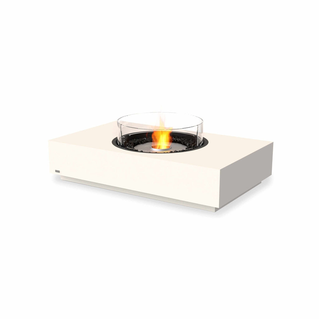 EcoSmart Fire Martini 50 bioethanol fire pit table in cream with a circular glass screen and central flame.