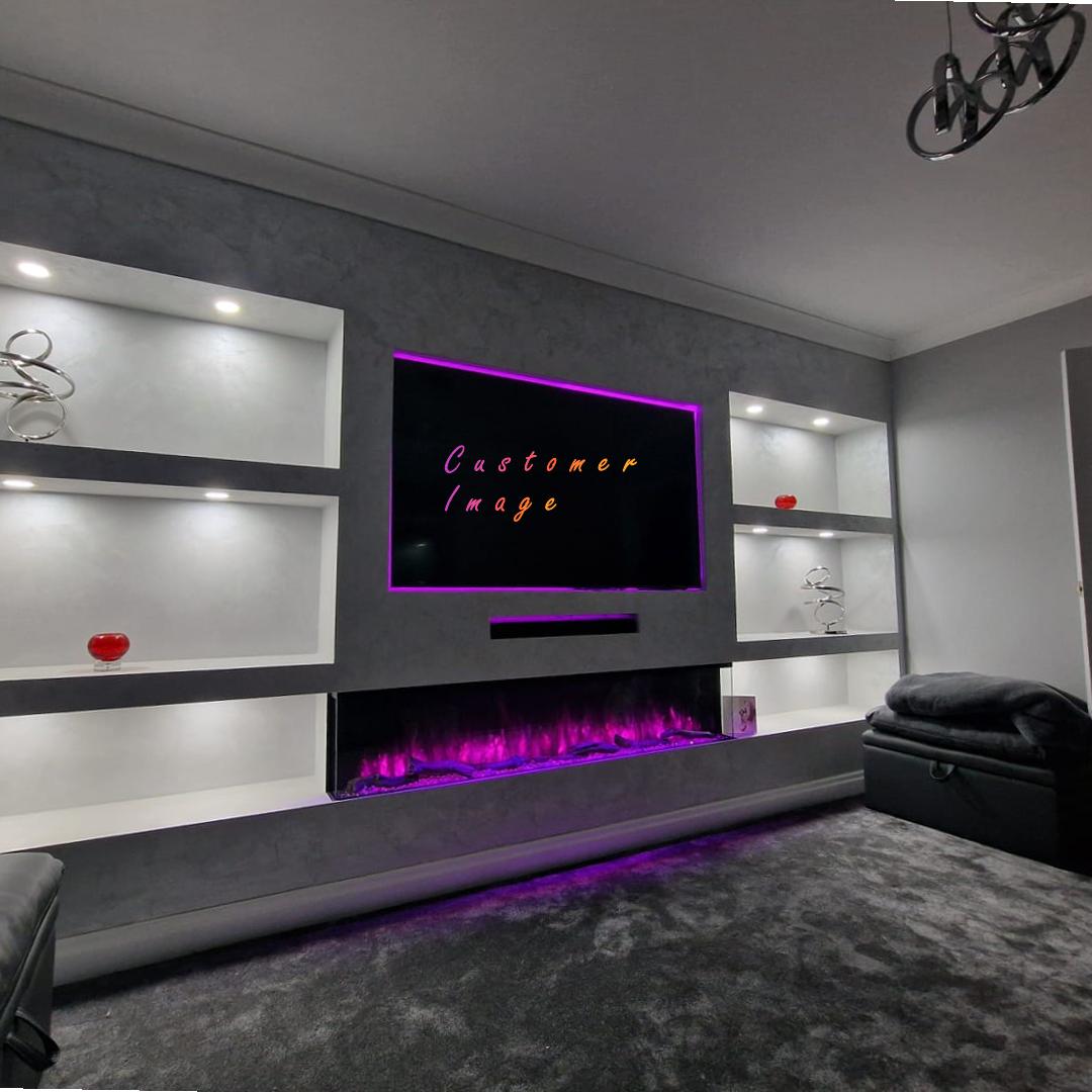 Luvelle 71” 3D Panoramic Media Wall Electric Fire set in a grey feature wall with illuminated shelving and purple lighting.