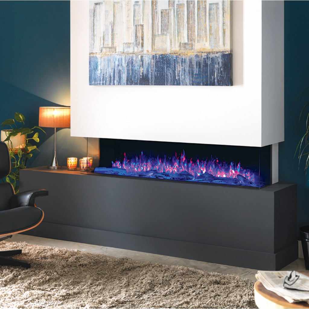 Solution SLE125 HD panoramic electric fire with vibrant blue and pink flames set in a modern black media wall.