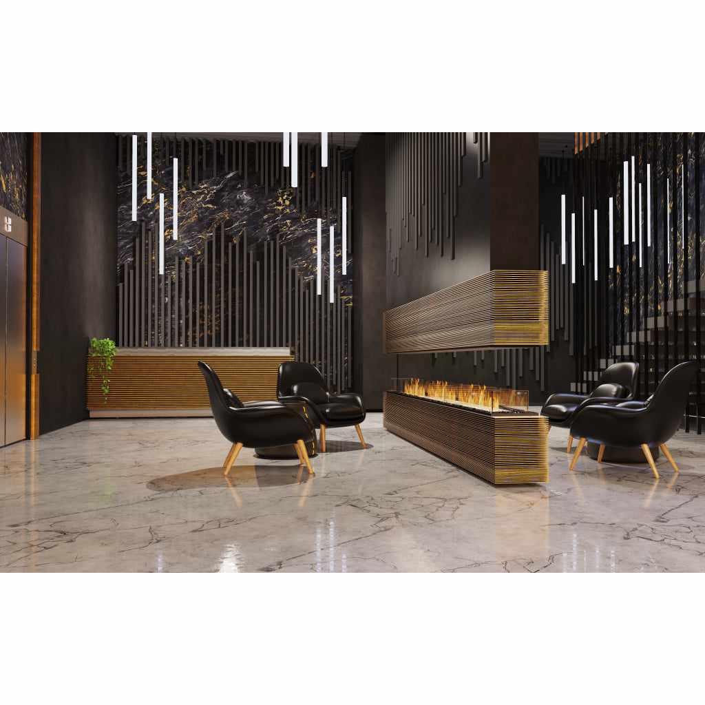 EcoSmart Fire Flex 32 bioethanol fireplace with a gold slatted finish in a modern lounge with black leather chairs.