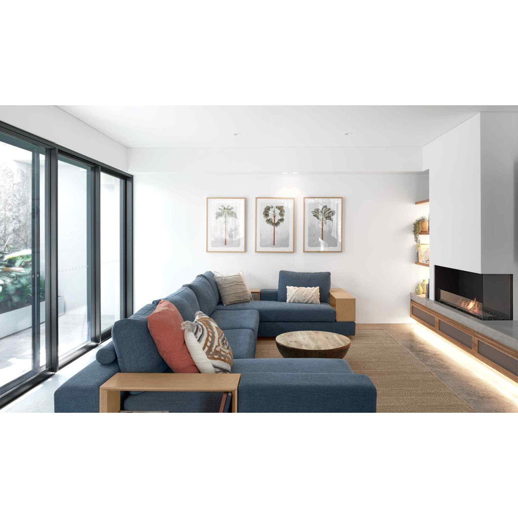 EcoSmart Fire Flex 50 bioethanol fireplace insert installed in a modern white wall above a wooden storage unit.