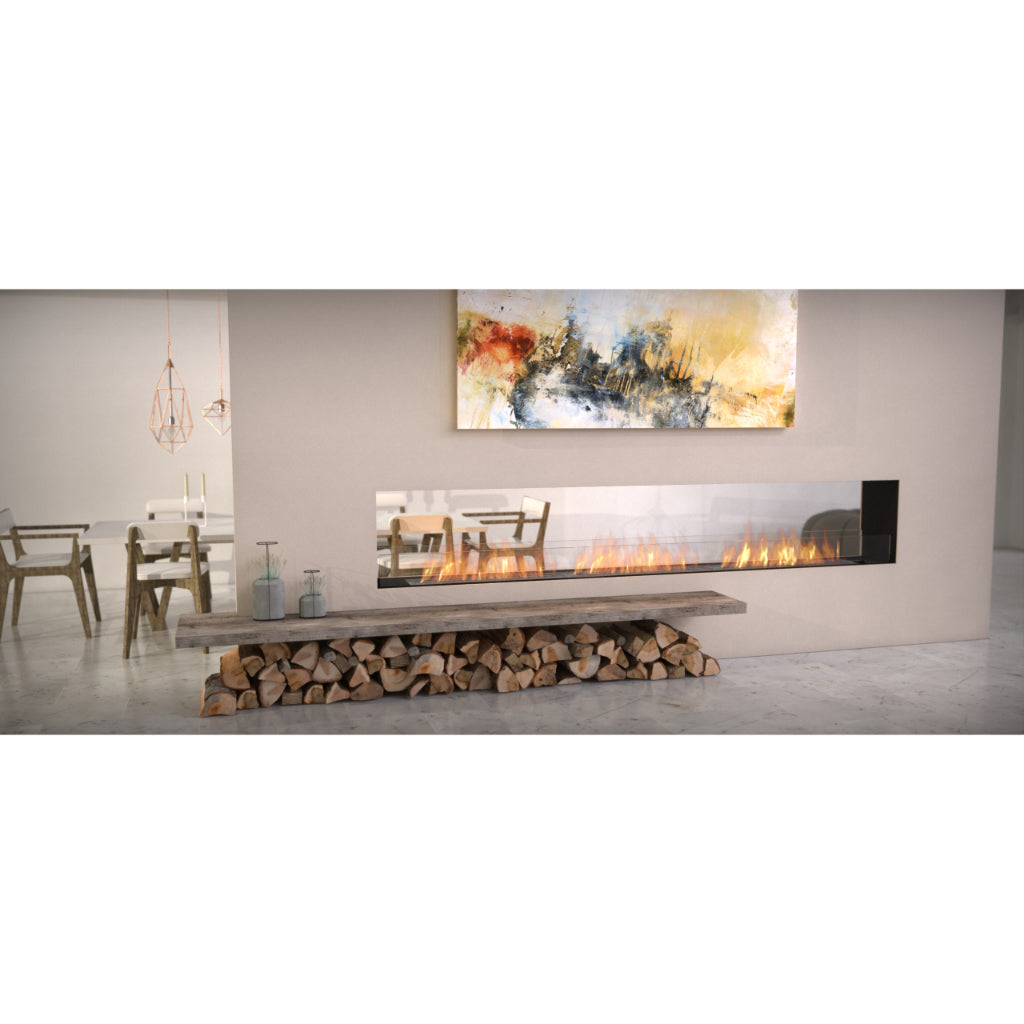 EcoSmart Fire Flex 68 bioethanol fireplace with a long linear flame, set in a wall above a rustic log storage bench.