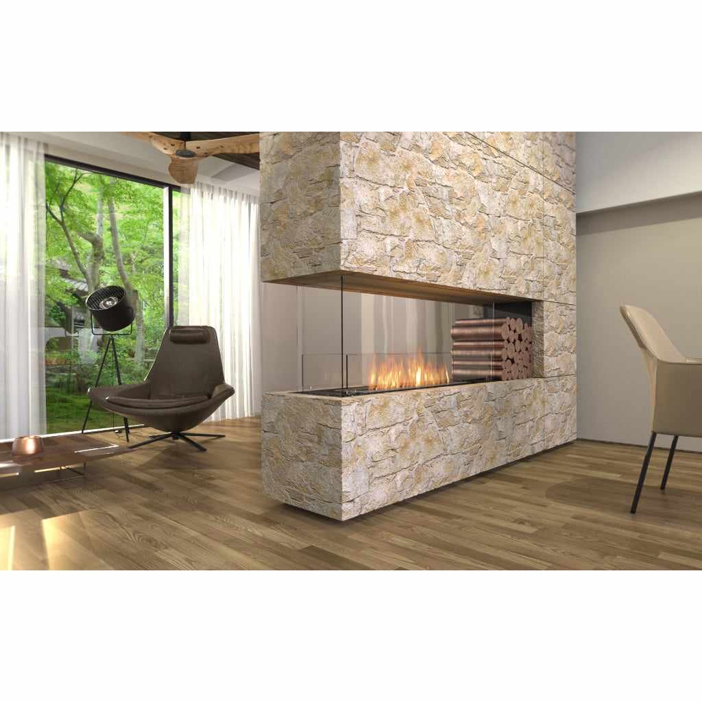 EcoSmart Fire Flex 78 bioethanol fireplace set into a rustic stone feature wall in a modern living room.