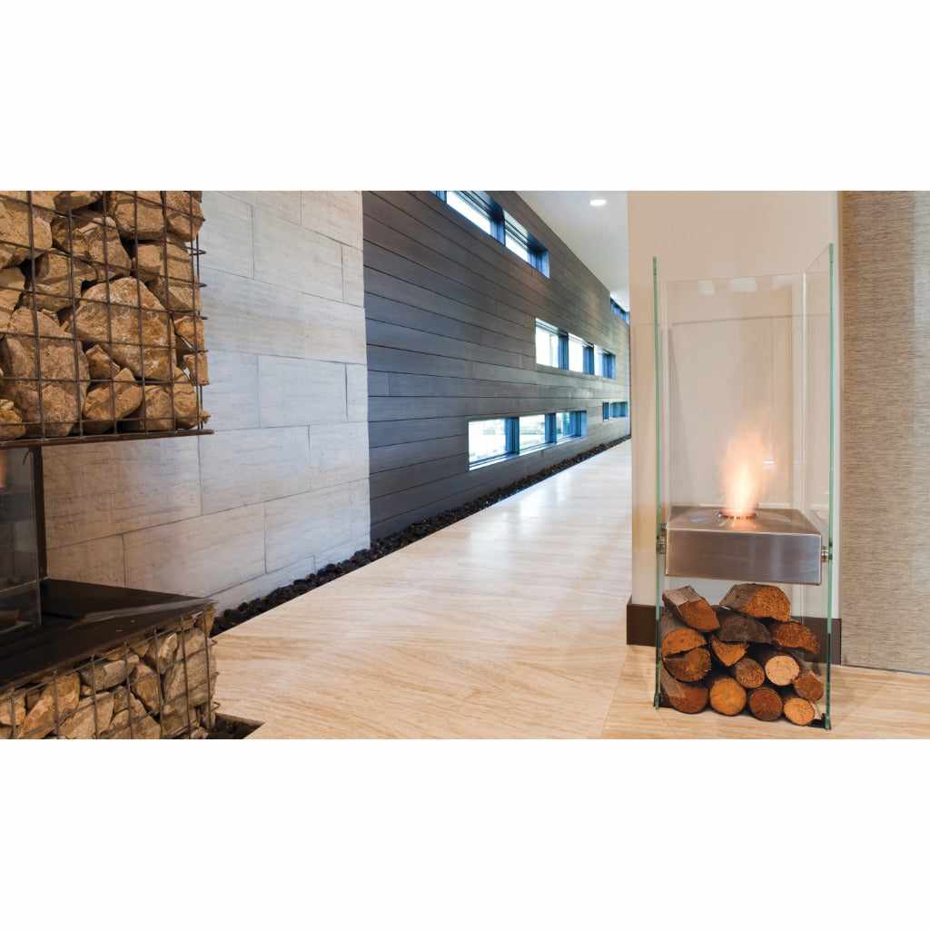 EcoSmart Fire Ghost bioethanol fireplace with a stainless steel burner and glass surround, featuring logs at the base.