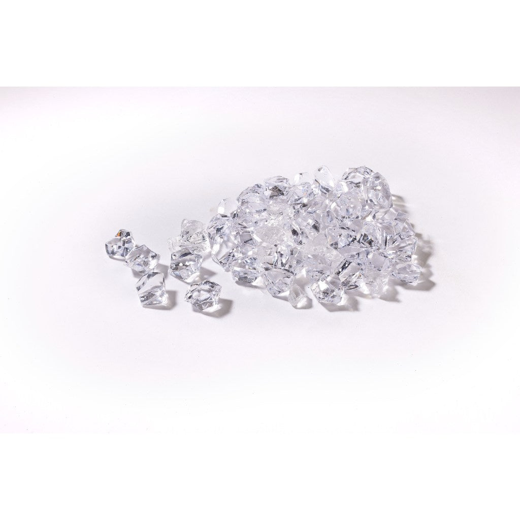Clear acrylic crystal fuel bed pieces for the Flametek Treviso electric fireplace on a white background.