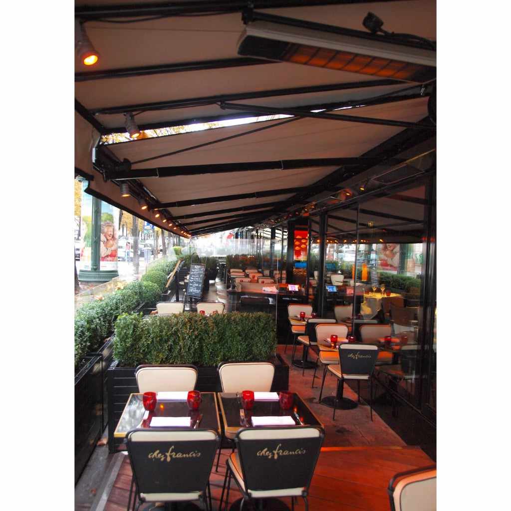 Heatscope Heaters Spot 1600W electric radiant heater mounted on the ceiling of an outdoor restaurant terrace.