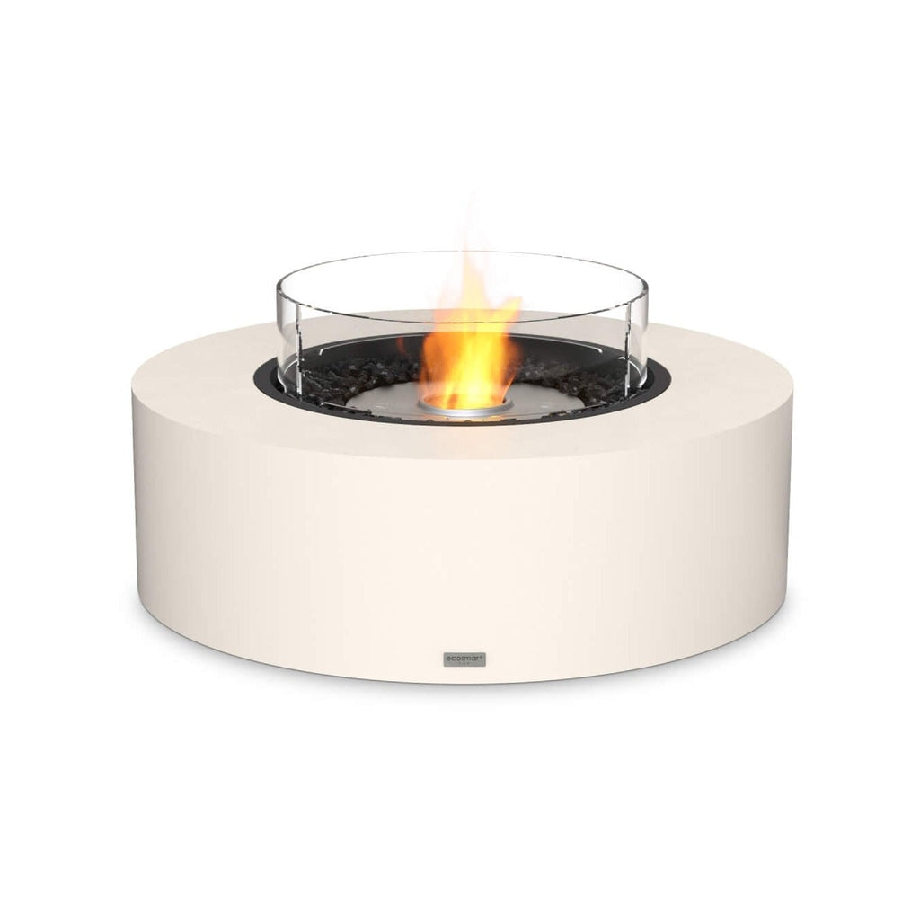EcoSmart Fire Ark 40 bioethanol fire pit table in bone white with a circular glass screen and black fire glass.