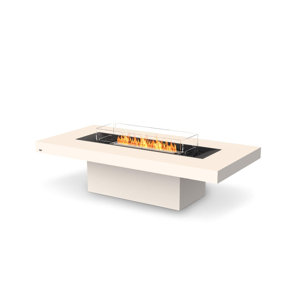 EcoSmart Fire Gin 90 bioethanol fire pit table in cream with a central burner, glass screen, and black stone finish.