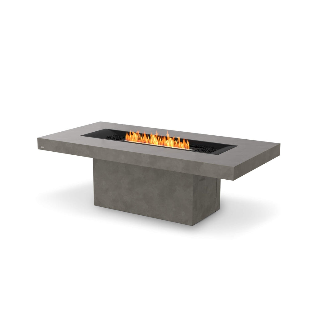 EcoSmart Fire Gin 90 dining fire pit table in grey concrete with a central linear flame and black decorative stones.