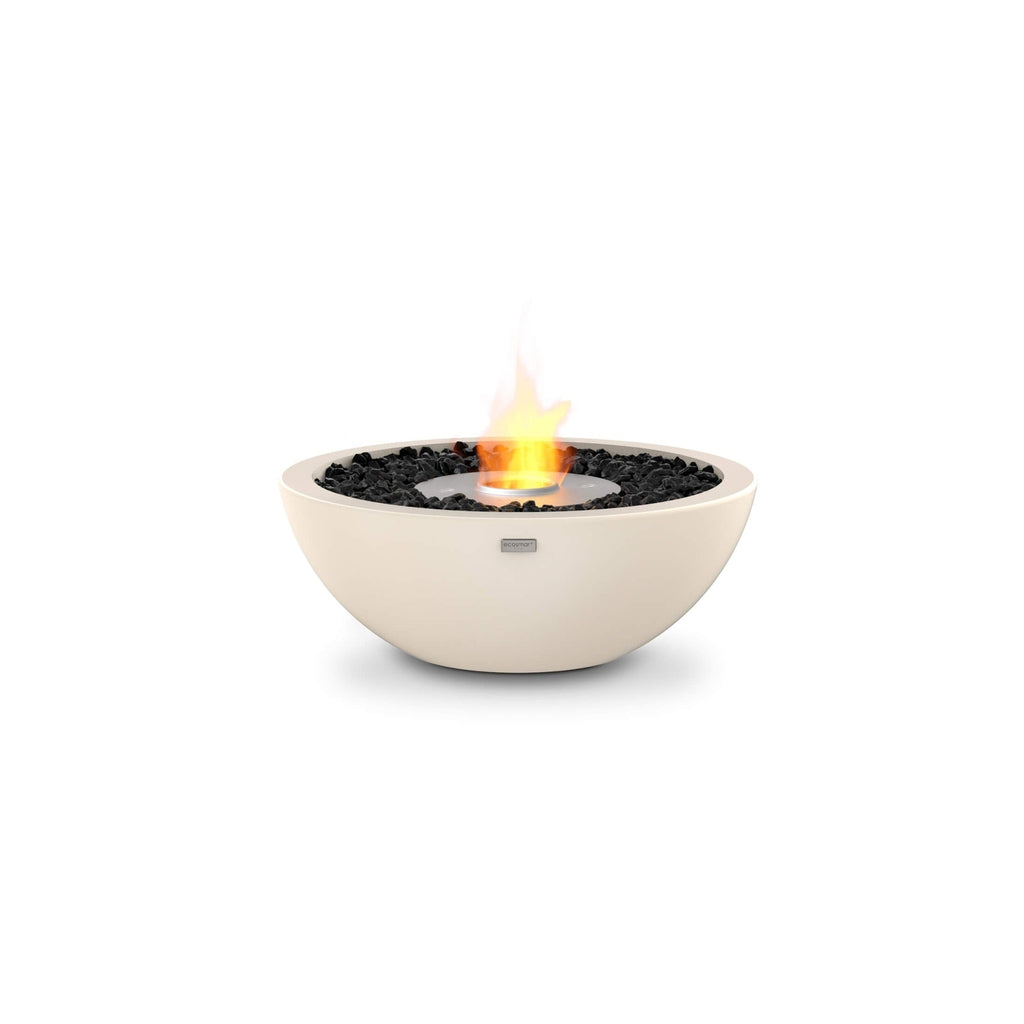 EcoSmart Fire Mix 600 bioethanol fire pit bowl in cream with black decorative stones and a central flame.