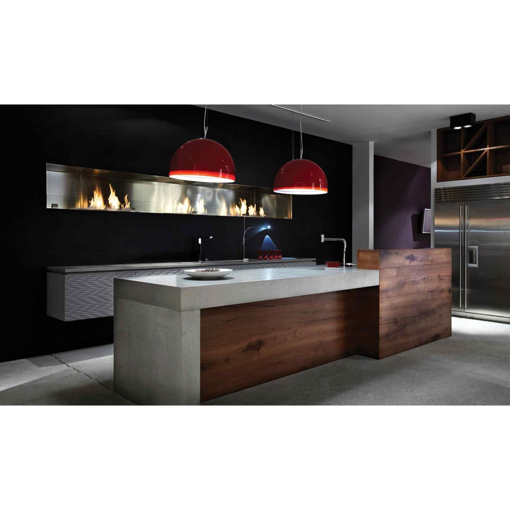 EcoSmart Fire XL900 ethanol burner integrated into a sleek, modern kitchen wall with a linear flame and stainless finish.