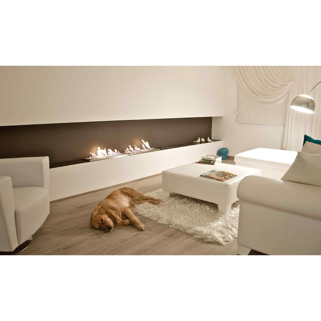 EcoSmart Fire XL900 ethanol burner integrated into a long, dark horizontal wall recess in a modern living room.
