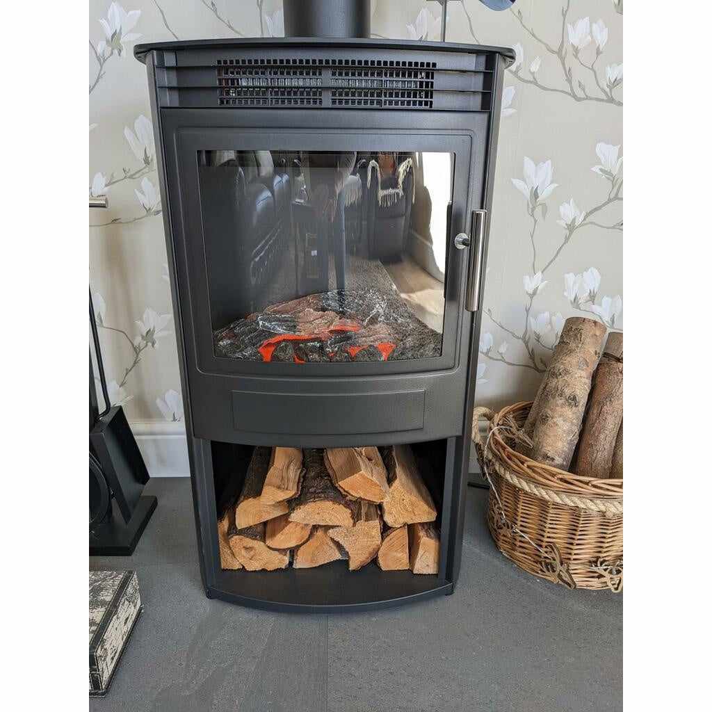 Flametek Alto T electric stove in black with a glass door, log fuel bed, and a lower storage area filled with logs.