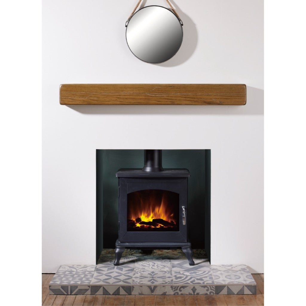 Flametek Reo 2kw electric stove in black with a realistic log flame effect, set on a patterned tile hearth.