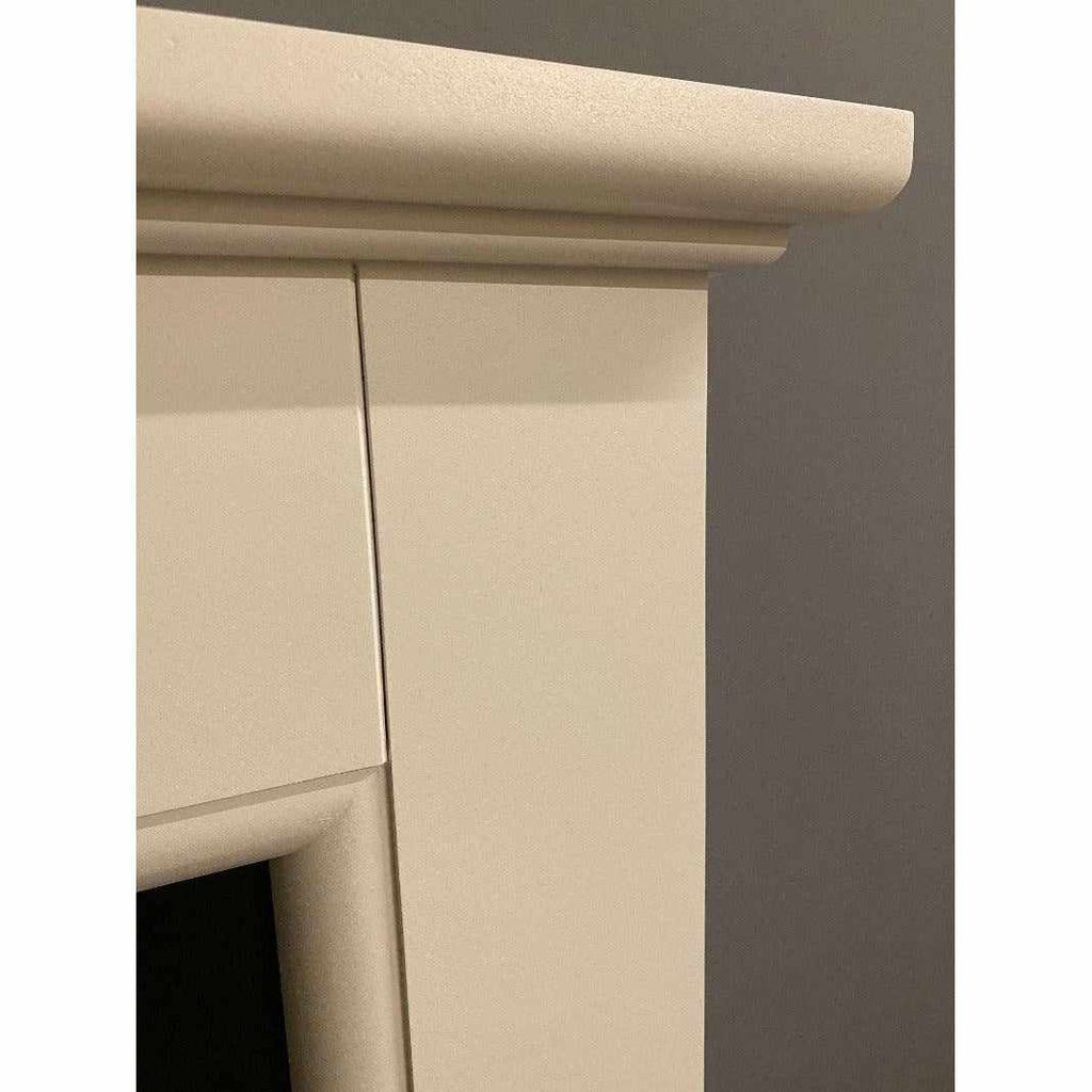Close-up of the cream-coloured mantelpiece corner on a Suncrest Talent Electric Fireplace Suite.